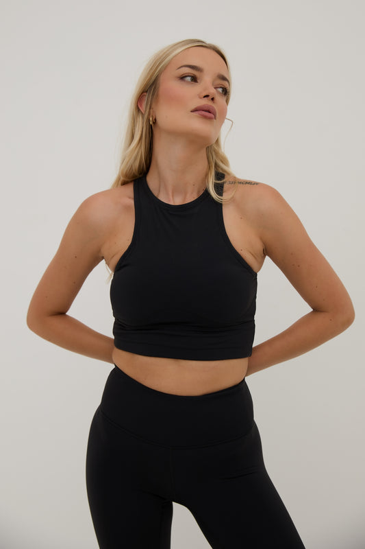 Women wearing activewear sports bra, black