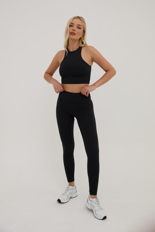 Women wearing high waisted scrunch gym leggings 